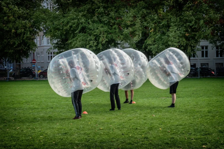 Bumper football soccer on a green field